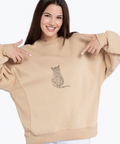 The cat is woven with threads, machine embroidery design