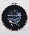 Whale on a black background, machine embroidery design