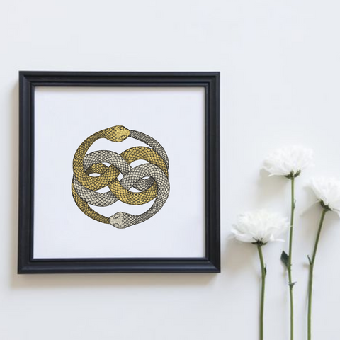 The amulet from the book The Neverending Story. Amulet Woven Snakes digital machine embroidery