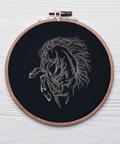 Horse on a black background, machine embroidery design