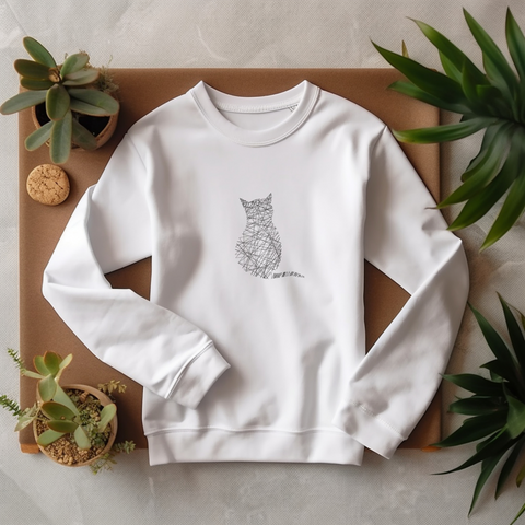 The cat is woven with threads, machine embroidery design